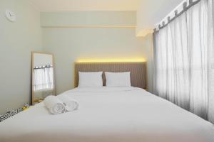 Modern Studio @ Springlake Summarecon Apartment By Travelio