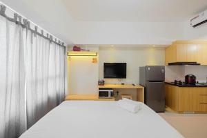 Modern Studio @ Springlake Summarecon Apartment By Travelio