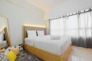 Modern Studio @ Springlake Summarecon Apartment By Travelio