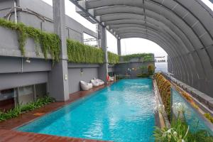 Relaxing 1BR Apartment at 15th Floor LAvenue By Travelio