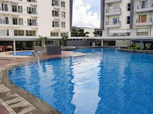 Cozy & Tranquil 1BR Apartment Casa De Parco BSD By Travelio