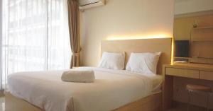 Strategic Studio Apartment at Beverly Dago with Mountain View By Travelio