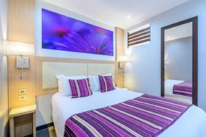 Hotels FH Confort Hotel Orleans Co'met : photos des chambres