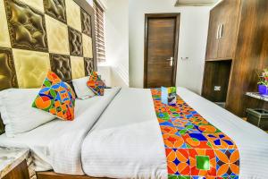 FabHotel Aman Residency Sharifpura
