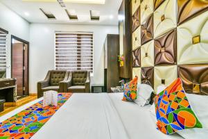 FabHotel Aman Residency Sharifpura