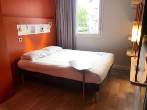 Hotels ibis budget Reims Parc Des Expositions : photos des chambres