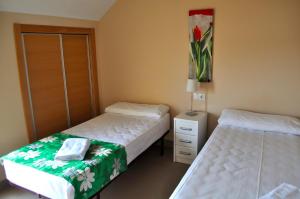 Three-Bedroom Apartment room in Ático 3 dormitorios a 100 metros de la playa