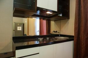 Comfortable Studio @ Green Bay Pluit Apartment By Travelio