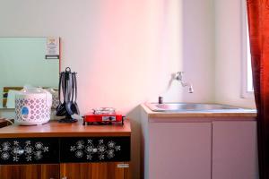 Simply Studio Apartment at Green Pramuka City By Travelio