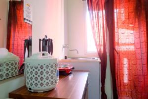 Simply Studio Apartment at Green Pramuka City By Travelio