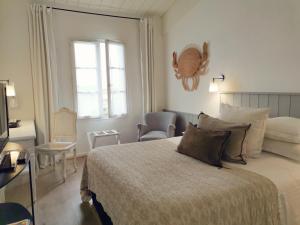 Hotels Le Clos Saint-Martin Hotel & Spa : photos des chambres