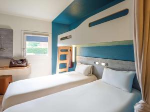Hotels Ibis budget Rouen Petit Quevilly : photos des chambres