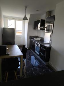 Appartements Bel appartement en plein coeur de ville : photos des chambres