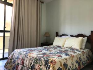 Três quartos na praia