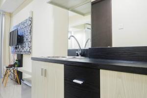 Cozy Studio at Tamansari Papilio Apartment By Travelio