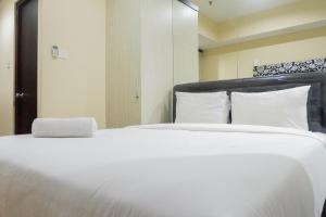 Cozy Studio at Tamansari Papilio Apartment By Travelio