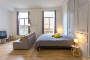 Appartements Les Augustins : photos des chambres