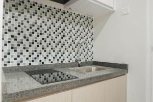 Minimalist Studio Apartment at Taman Melati By Travelio