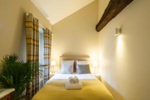 Maisons de vacances Cottage Livingstone by Cocoonr : photos des chambres