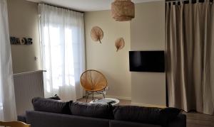 Appartements La maison Virginie logements de 1 a 5 pers chaleureux centre, parking, linge, wifi, proximite lac canal piscine : photos des chambres