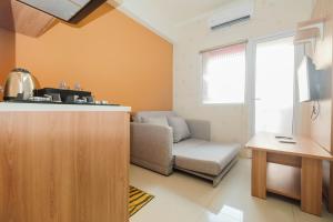 2BR Apartment Green Pramuka City near Shopping Mall By Travelio