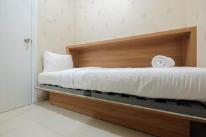 2BR Apartment Green Pramuka City near Shopping Mall By Travelio