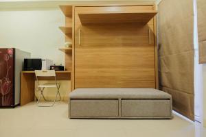 Modern Studio Apartment at 27th Floor Green Pramuka City By Travelio