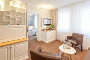 Junior Suite with Balcony room in Hotel Vier Jahreszeiten Binz klimaneutral