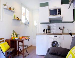 Appartements LE REFUGE avec terrasse et jardin, en plein centre-ville, gare 5 minutes a pieds : photos des chambres