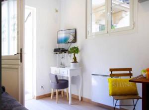 Appartements LE REFUGE avec terrasse et jardin, en plein centre-ville, gare 5 minutes a pieds : photos des chambres