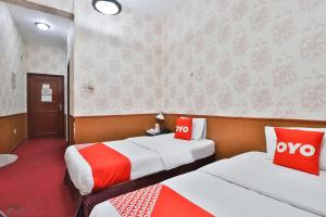 Standard Twin Room room in OYO 271 Parasol Hotel