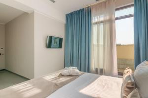 Deluxe Double Room with Balcony room in New Era Hotel