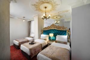 Superior Triple Room room in White Monarch Hotel