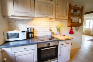 Appartements Le Gite du Moulin : photos des chambres