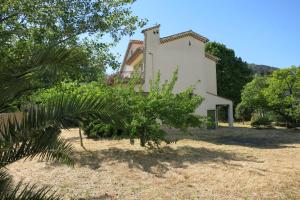 Villas Maison lumineuse et spacieuse avec jardin arbore : photos des chambres