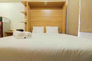 Modern Studio Apartment at 26th Floor Green Pramuka City By Travelio