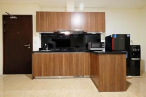 2BR Pancoran LAvenue Apartment Great Facility By Travelio