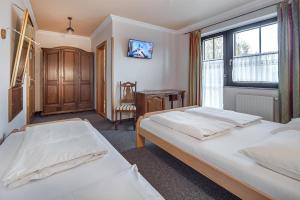 Triple Room with Private Bathroom room in Garni Hotel Terano