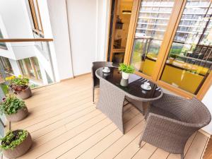 VacationClub – Olympic Park Apartament A106