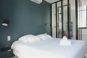 Maisons de vacances L'Echoppe - Maison 3 chambres avec 2 salles de bain et grande Terrasse : photos des chambres