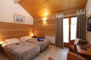 Hotels Cosy Appart'Hotel - Panoramic Village - La Grave : photos des chambres