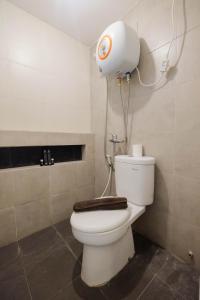 Cozy and Elegant 2BR Bassura City Apartment By Travelio