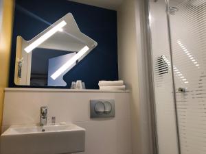 Hotels ibis budget Reims Parc Des Expositions : photos des chambres