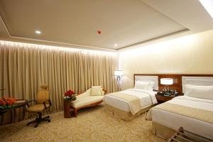 Comfort Twin Room room in Royal Swiss Lahore