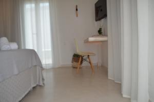 Classic Triple Room with Balcony room in Faros Resort