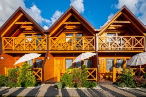 Chalet SARBIN domki letniskowe nad morzem Sarbinowo Pologne
