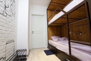 Bed in 8-Bed Dormitory Room room in хостел Hi Loft