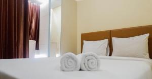 Elegant Studio Apartment at Tamansari Papilio By Travelio