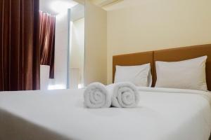 Elegant Studio Apartment at Tamansari Papilio By Travelio