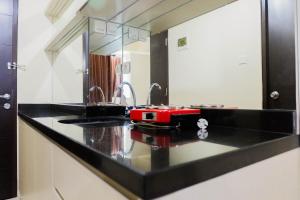 Elegant Studio Apartment at Tamansari Papilio By Travelio